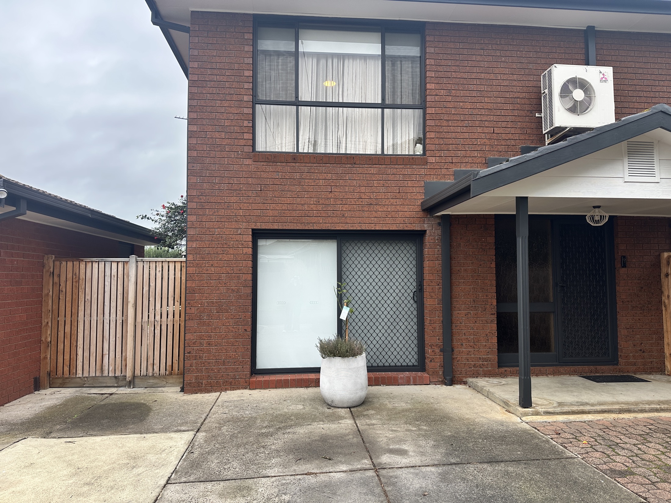 The front of the house, showing your door and the gate to the lockbox